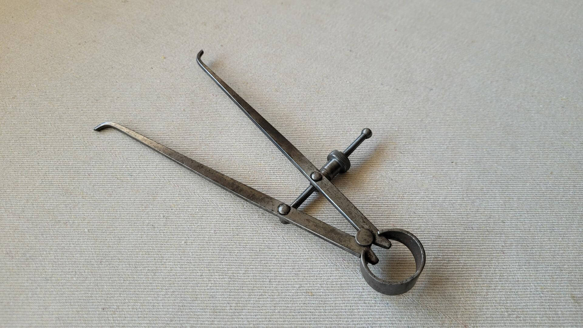 Vintage adjustable spring outside caliper divider by Union Tool Co from Orange, Mass. Collectible made in USA carpenter machinist marking & measuring tool