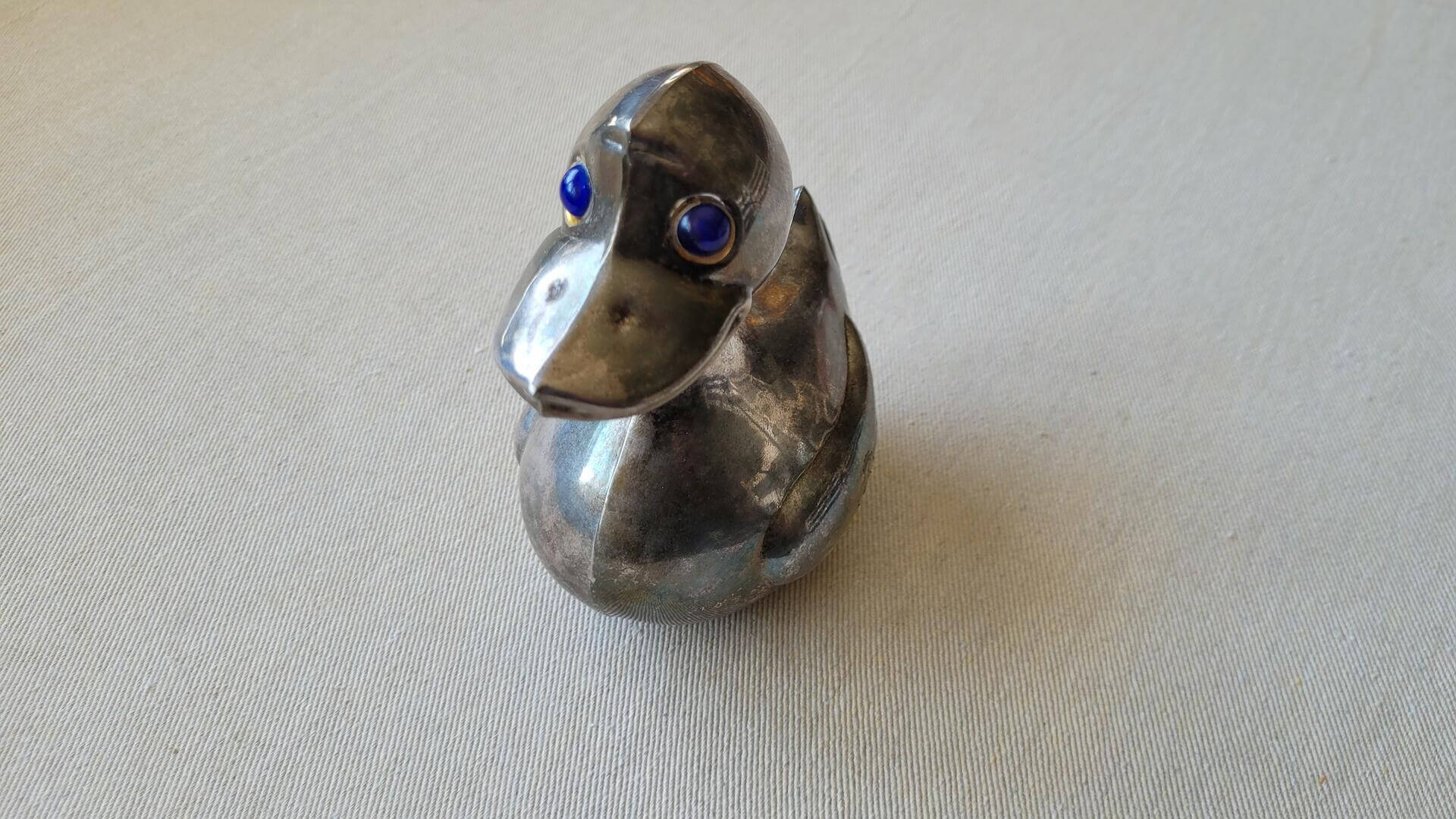 Vintage WM. A. Rogers duck coin bank with blue rhinestone eyes without the key. Retro made in Italy collectible piggy bank, registers & vending memorabilia