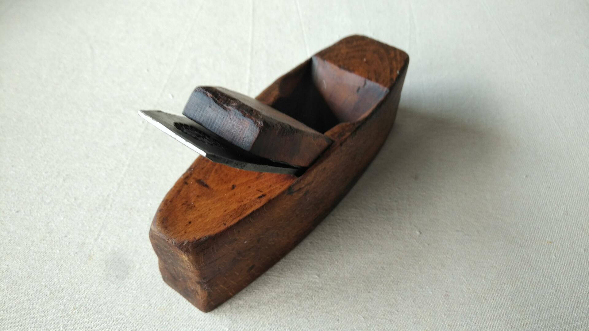 Vintage coffin style smoothing wood plane w rare overstamped Butcher Warranted Cast Steel plane. Antique collectible woodworking and cabinet maker edge tool