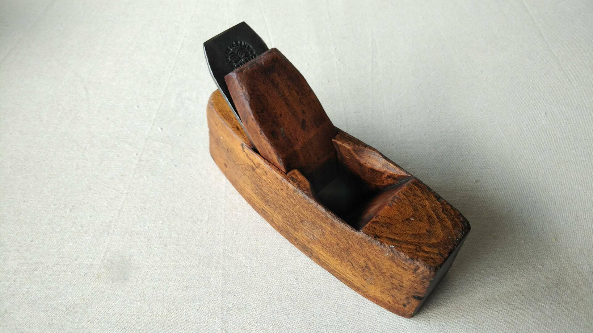 Vintage coffin style smoothing wood plane w rare overstamped Butcher Warranted Cast Steel plane. Antique collectible woodworking and cabinet maker edge tool