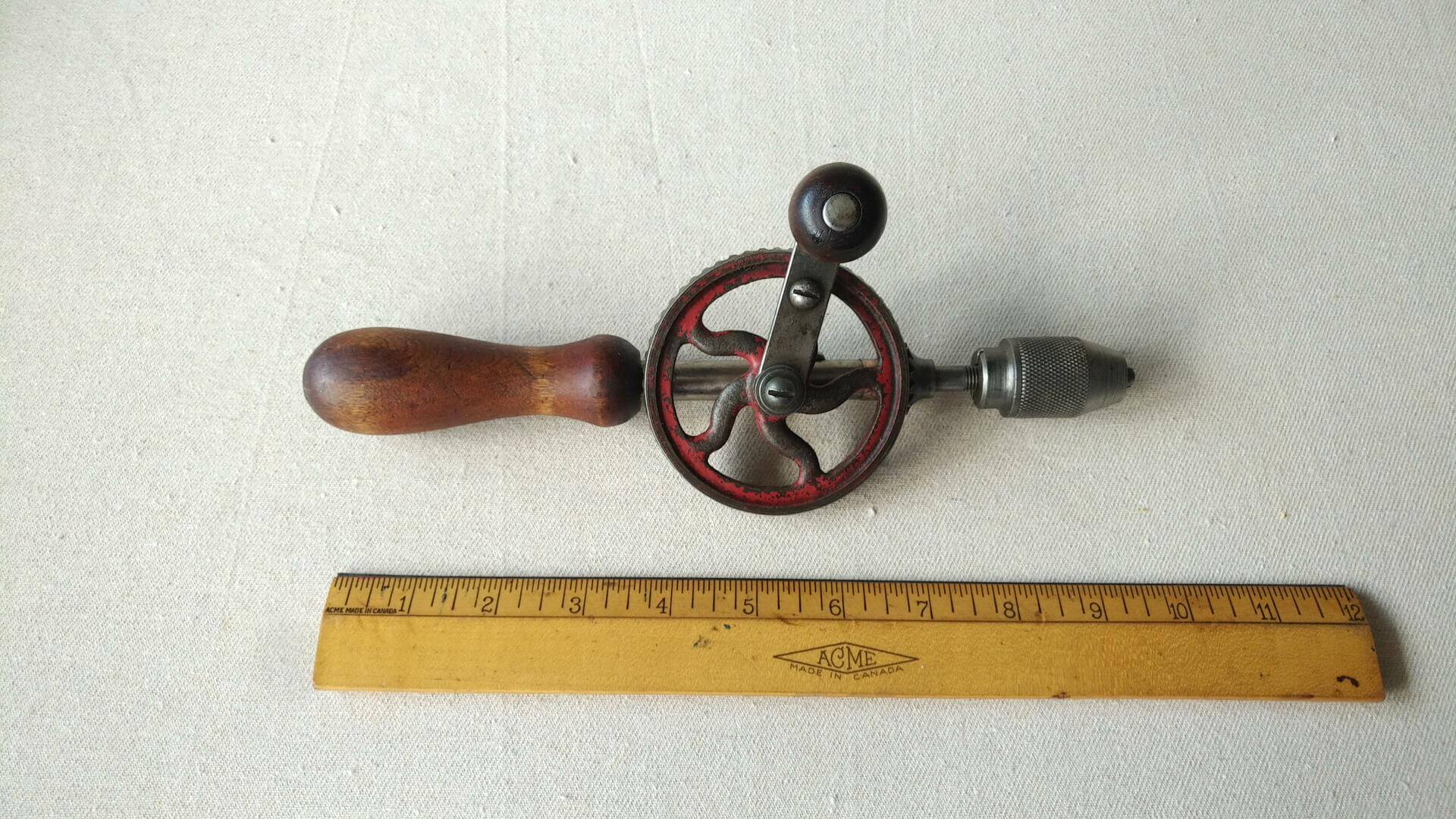 Vintage egg beater style manual woodworking push drill with the beautiful wooden handle 10 inches long. Antique collectible carpentry hand tools