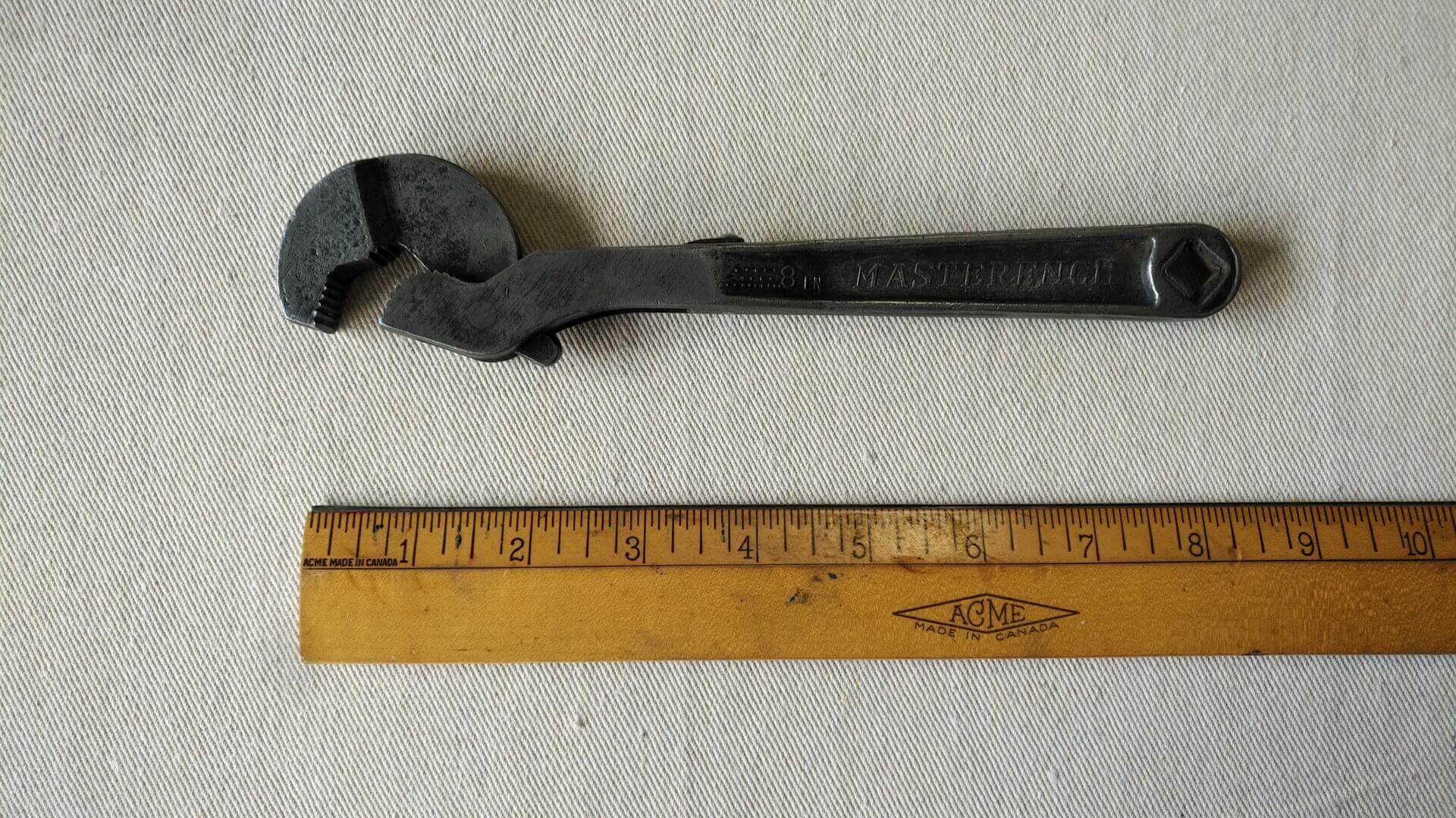 Nice vintage Heller Brothers 8 inch adjustable Masterench double jaw wrench. Antique made in USA collectible automotive and plumbing gripping hand tools