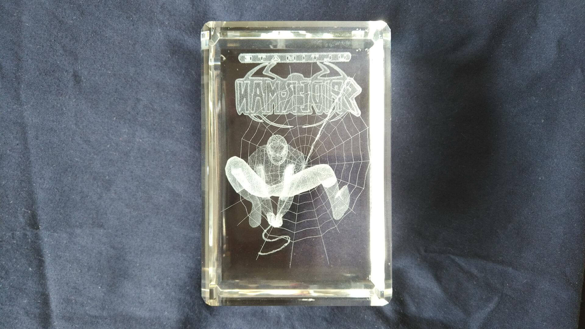 Rare Ultimate Spider Man 3D laser engraved holographic crystal glass cube paperweight. Collectible Marvel superhero decorative memorabilia